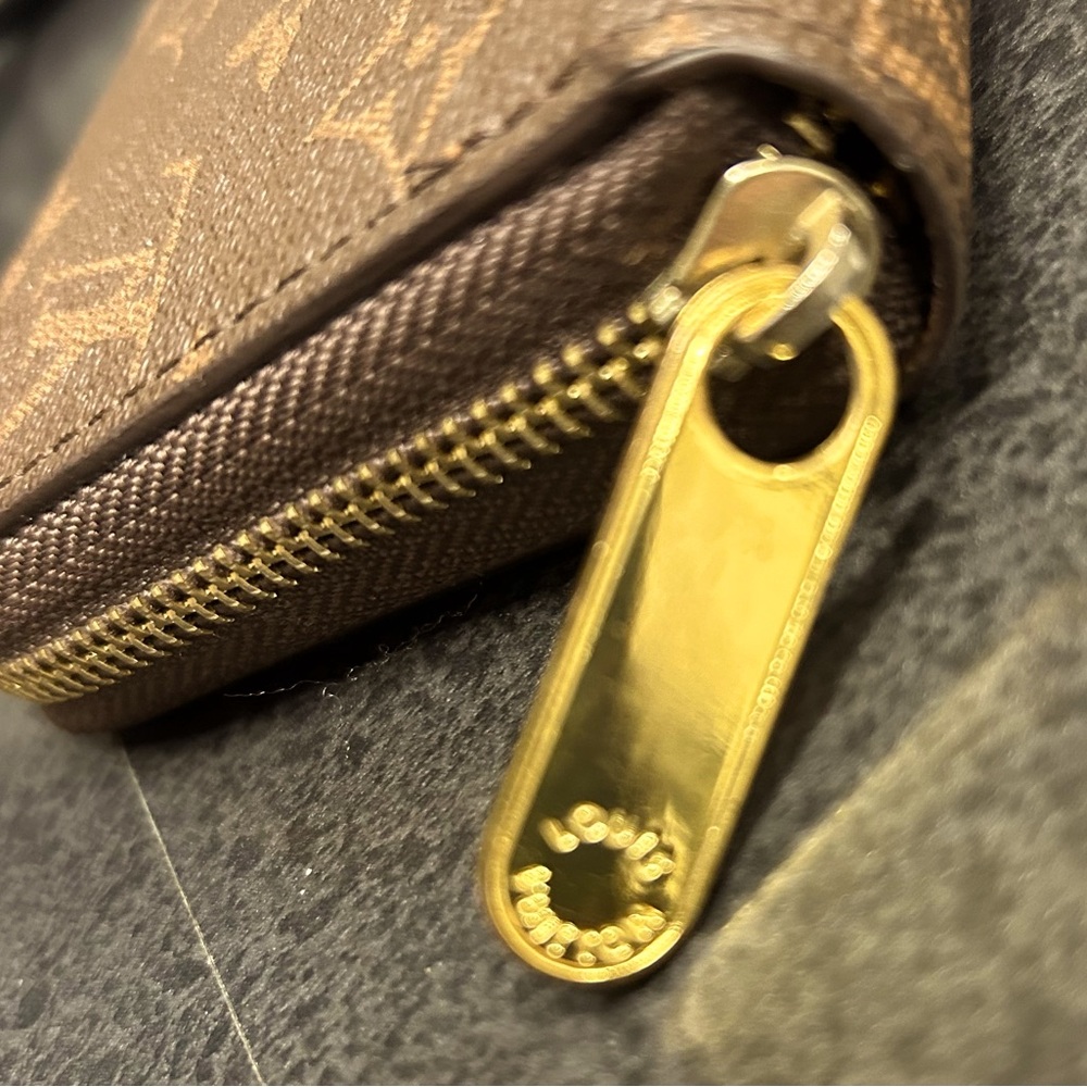 Louis Vuitton zippy wallet.